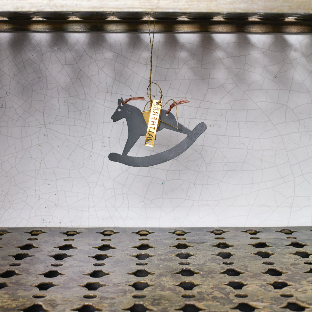 Ornement - Cheval à bascule